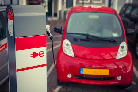 Electric Car Charging on the Street, Amsterdam, North Holland, Netherlands Stock Photo - Premium Royalty-Free, Code: 600-06383712