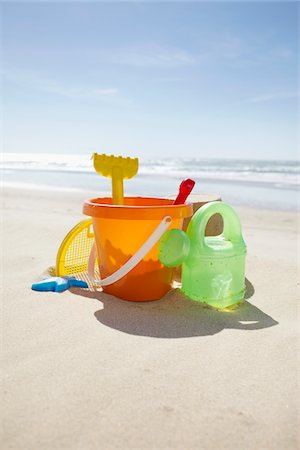 plastic toys - Toy Bucket, Rake and Watering Can at the Beach, Cap Ferret, Gironde, Aquitaine, France Stock Photo - Premium Royalty-Free, Code: 600-06407676