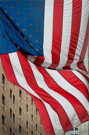 American Flag flapping in Wind, 6th Avenue, Manhattan, New York, USA Stock Photo - Premium Royalty-Free, Code: 600-06438872