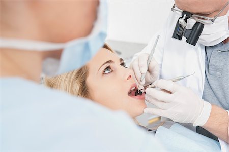 Young Woman getting Check-up at Dentist's Office, Germany Photographie de stock - Premium Libres de Droits, Code: 600-06438899