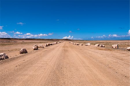 deserted nature pictures - Boulders along Desert Road, Arikok National Park, Aruba, Lesser Antilles, Caribbean Stock Photo - Premium Royalty-Free, Code: 600-06431267