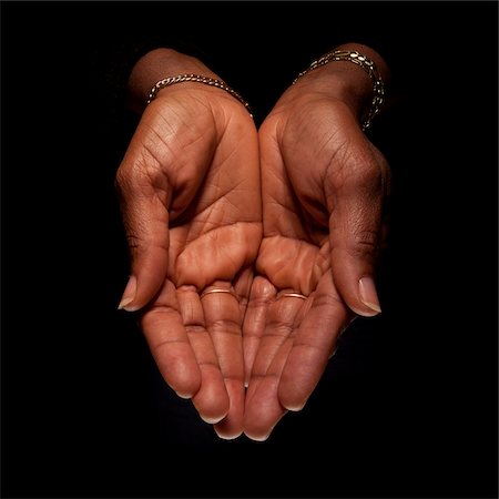 person cupping hands - Close-up of Palms of Woman's Hands in Heart-shape, Studio Shot Photographie de stock - Premium Libres de Droits, Code: 600-06452116