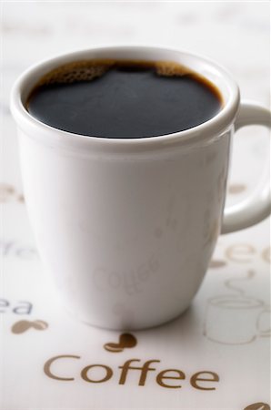 Close-up of Cup of Black Coffee with Coffee Text, Studio Shot Foto de stock - Sin royalties Premium, Código: 600-06486050