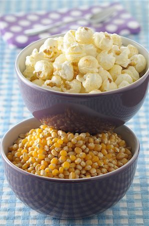 Bowls of Corn Kernels and Popcorn on Blue Gingham Background, Studio Shot Stock Photo - Premium Royalty-Free, Code: 600-06486082