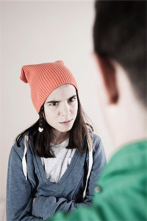 quarelling young boys and girls - Boy and Girl Arguing in Studio Stock Photo - Premium Royalty-Free, Code: 600-06486437