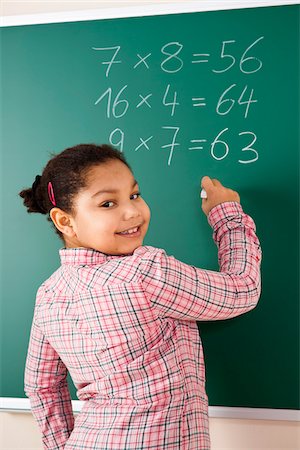 Girl Answering Question at Blackboard in Classroom, Baden-Wurttemberg, Germany Stock Photo - Premium Royalty-Free, Code: 600-06548567