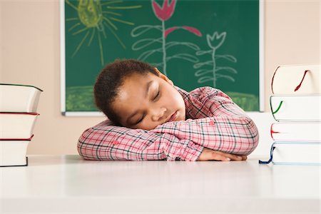 stack of text books - Girl Sleeping in Classroom, Baden-Wurttemberg, Germany Stock Photo - Premium Royalty-Free, Code: 600-06548588