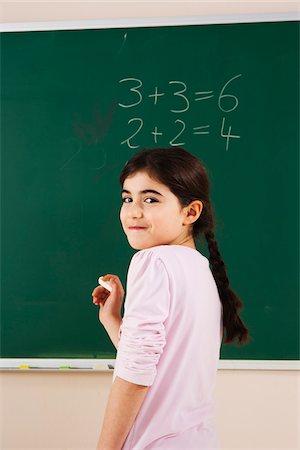 simsearch:600-07192152,k - Girl Answering Question at Blackboard in Classroom, Baden-Wurttemberg, Germany Stock Photo - Premium Royalty-Free, Code: 600-06548616