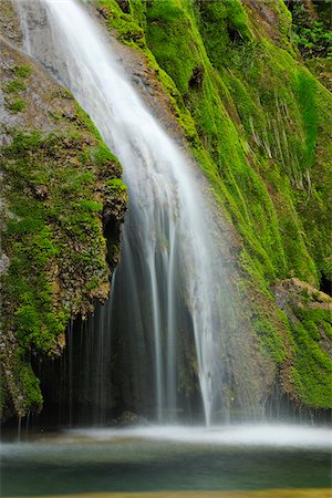 simsearch:600-06553321,k - Cascade des Tufs falling over green Moss, Arbois, Jura, Jura Mountains, Franche-Comte, France Stock Photo - Premium Royalty-Free, Code: 600-06553319