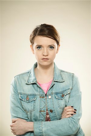 portrait teen serious one - Portrait of Teenage Girl, in Studio Stock Photo - Premium Royalty-Free, Code: 600-06570937