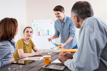 Business People Working and Meeting in Office, Looking at Color Swatches Stock Photo - Premium Royalty-Free, Code: 600-06620994