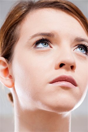 expressionless - Close-up Portrait of Teenage Girl with Blue Eyes Stock Photo - Premium Royalty-Free, Code: 600-06621022