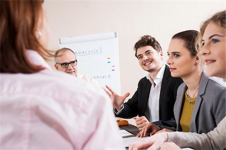 simsearch:600-06645504,k - Group of Business People having Meeting in Boardroom Stock Photo - Premium Royalty-Free, Code: 600-06645485