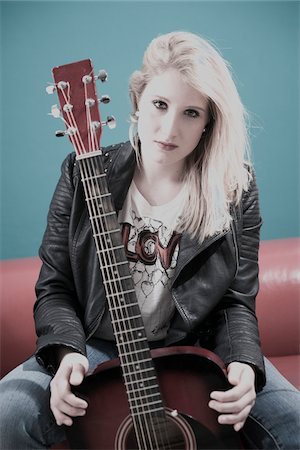 Portrait of Woman with Acoustic Guitar Stock Photo - Premium Royalty-Free, Code: 600-06675140