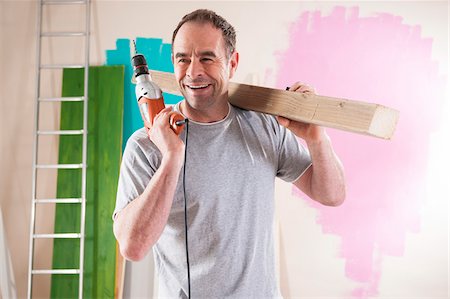 peinture - Mature Man Renovating his Home Photographie de stock - Premium Libres de Droits, Code: 600-06679376