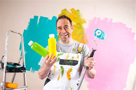 simsearch:600-06679376,k - Mature Man Renovating his Home and Deciding between Paint Colors Stock Photo - Premium Royalty-Free, Code: 600-06679392