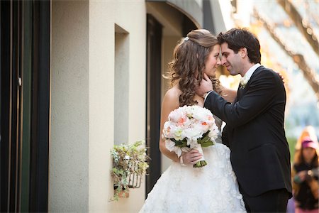 simsearch:700-07232339,k - Portrait of Bride and Groom Nose to Nose, Toronto, Ontario, Canada Stock Photo - Premium Royalty-Free, Code: 600-06701868