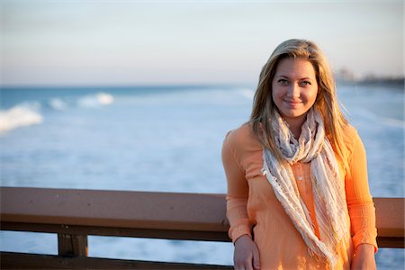 simsearch:600-06732631,k - Portrait of Young Woman Standing on Pier at Beach, Jupiter, Palm Beach County, Florida, USA Stock Photo - Premium Royalty-Free, Code: 600-06701924