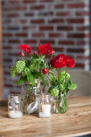 ranunculus sp - Candles and Flowers in Vases at Wedding, Toronto, Ontario, Canada Stock Photo - Premium Royalty-Free, Code: 600-06758138