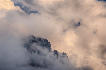 simsearch:600-06758344,k - Mountain Peak in Clouds at Sunrise, Val Gardena, South Tyrol, Trentino-Alto Adige, Dolomites, Italy Stock Photo - Premium Royalty-Free, Code: 600-06758346