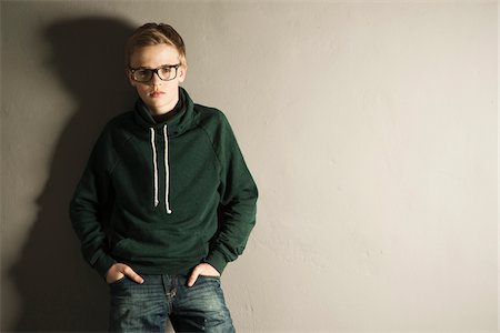 portrait young person glasses - Portrait of Boy, Studio Shot Stock Photo - Premium Royalty-Free, Code: 600-06752463