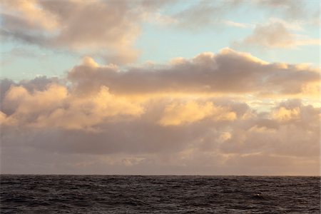 Ocean view in the Atlantic Ocean of clouds at sunset Stock Photo - Premium Royalty-Free, Code: 600-06782121