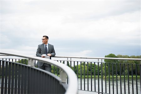 fußweg - Mature businessman standing on bridge, Mannheim, Germany Stockbilder - Premium RF Lizenzfrei, Bildnummer: 600-06782219