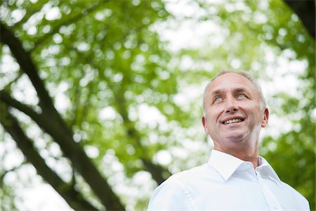 simsearch:600-07148342,k - Close-up portrait of mature man in park, Mannheim, Germany Stock Photo - Premium Royalty-Free, Code: 600-06782235