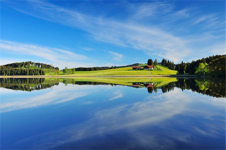 simsearch:600-06803887,k - Landscape and Sky Reflecting in Lake, Sameister Weiher, Rosshaupten, Bavaria, Germany Stock Photo - Premium Royalty-Free, Code: 600-06803882