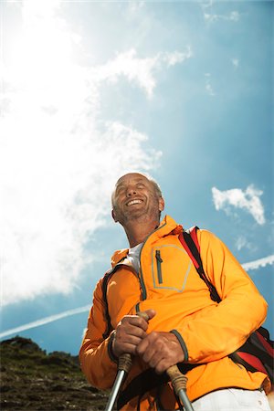 senior citizen outside copy space - Portrait of mature man hiking in mountains, Tannheim Valley, Austria Stock Photo - Premium Royalty-Free, Code: 600-06826366