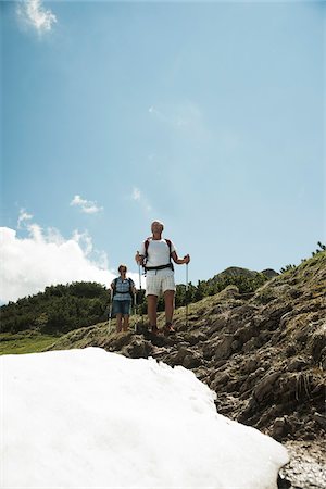 Mature couple hiking in mountains, Tannheim Valley, Austria Foto de stock - Sin royalties Premium, Código: 600-06826384