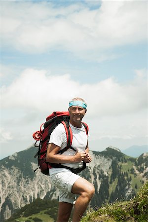 simsearch:600-06841901,k - Portrait of mature man hiking in mountains, Tannheim Valley, Austria Stock Photo - Premium Royalty-Free, Code: 600-06826390