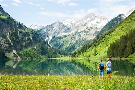 Couple Hiking by Lake, Vilsalpsee, Tannheim Valley, Tyrol, Austria Stock Photo - Premium Royalty-Free, Code: 600-06841774