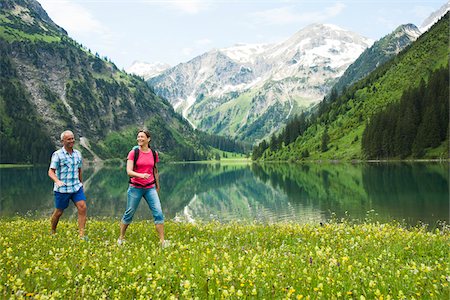 Couple Hiking by Lake, Vilsalpsee, Tannheim Valley, Tyrol, Austria Stock Photo - Premium Royalty-Free, Code: 600-06841781