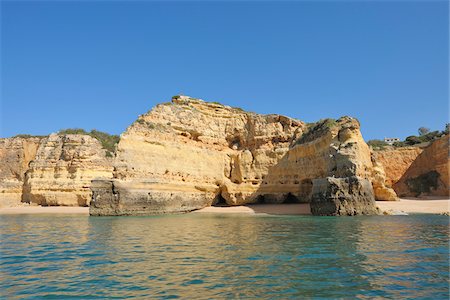 stack rock formation - Cliffs between Armacao de Pera and Portimao, Benagil, Lagoa, Portugal Stock Photo - Premium Royalty-Free, Code: 600-06841833