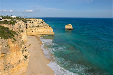 Rocky Coastline with Atlantic Ocean at Praia da Marinha, Lagoa, Algarve, Portugal Stock Photo - Premium Royalty-Free, Code: 600-06841862