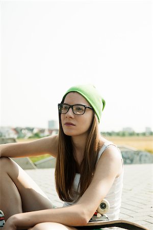 eyeglasses for teenagers - Teenage Girl Hanging out in Skatepark, Feudenheim, Mannheim, Baden-Wurttemberg, Germany Stock Photo - Premium Royalty-Free, Code: 600-06894971
