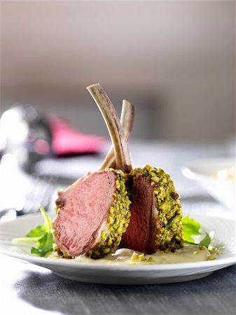 dinner - Single Serving of Lamb Coated with Pistachio on Table Stock Photo - Premium Royalty-Free, Code: 600-06895069