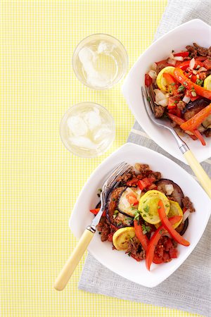 supper - Overhead View of Beef and Eggplant Stir-fry with Peppers and Zucchini, Studio Shot Stock Photo - Premium Royalty-Free, Code: 600-06934990
