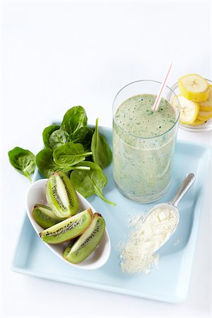 powder - Green Protein Smoothie with Kiwi, Spinach and Banana, Studio Shot Stock Photo - Premium Royalty-Free, Code: 600-06935002