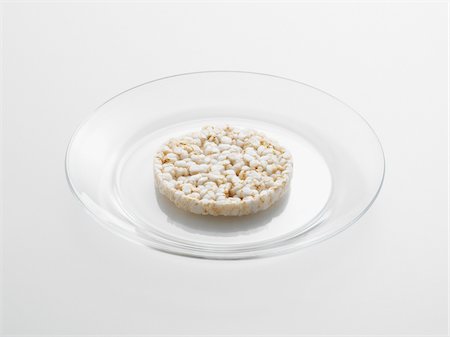 plain - Rice Cake on Glass Plate, Studio Shot Stock Photo - Premium Royalty-Free, Code: 600-06967745