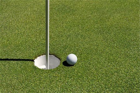 Close-up of Gimme Ball on Golf Green, Palo Alto, California, USA Photographie de stock - Premium Libres de Droits, Code: 600-06961885
