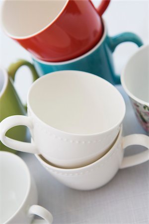 empty tea cups - Variety of Colorful Mugs Stacked, Studio Shot Stock Photo - Premium Royalty-Free, Code: 600-07066872