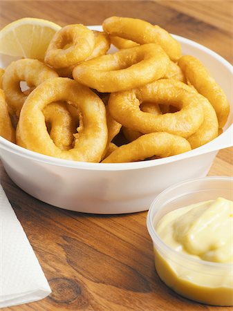 squid - Fried calamari in bowl with condiment Foto de stock - Sin royalties Premium, Código: 600-07067112