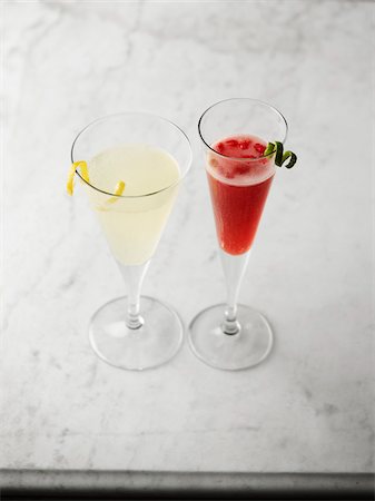 simsearch:600-06961857,k - Holiday Cocktails in Champagne Glasses, Studio Shot Stock Photo - Premium Royalty-Free, Code: 600-07067604