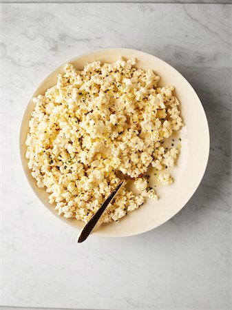Overhead View of Bowl of Truffle Popcorn, Studio Shot Stock Photo - Premium Royalty-Free, Code: 600-07067623