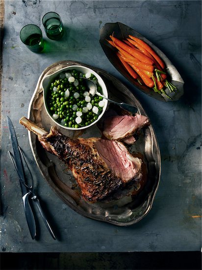 Overhead View of Roast Lamb with Carrots and Peas, Studio Shot Stock Photo - Premium Royalty-Free, Artist: Michael Alberstat, Image code: 600-07067649