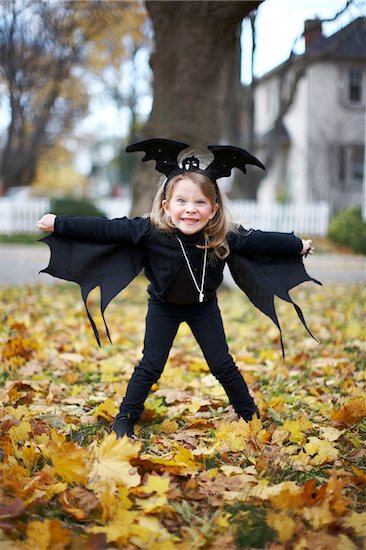 Girl in Bat Halloween Costume, Toronto, Ontario, Canada Stock Photo - Premium Royalty-Free, Artist: Michael Alberstat, Image code: 600-07110415
