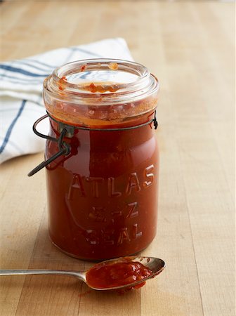 food sauces - Jar of BBQ Sauce with Spoon, Studio Shot Stock Photo - Premium Royalty-Free, Code: 600-07110413