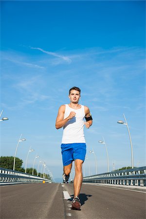 pedometer - Young Man Running, Worms, Rhineland-Palatinate, Germany Stock Photo - Premium Royalty-Free, Code: 600-07110573